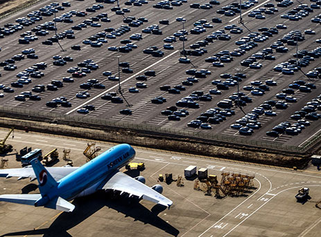 Airplane With Cars Parked